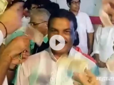Ganesh mandal workers flying money on Congress MLA Nazeem Khan